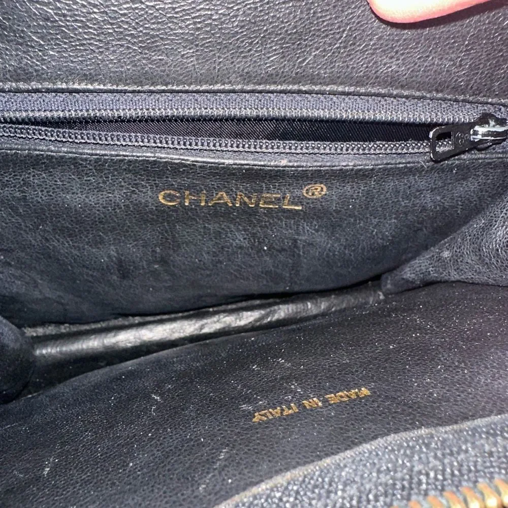 CHANEL Black Chevron Leather Shoulder Bag with Gold Accent